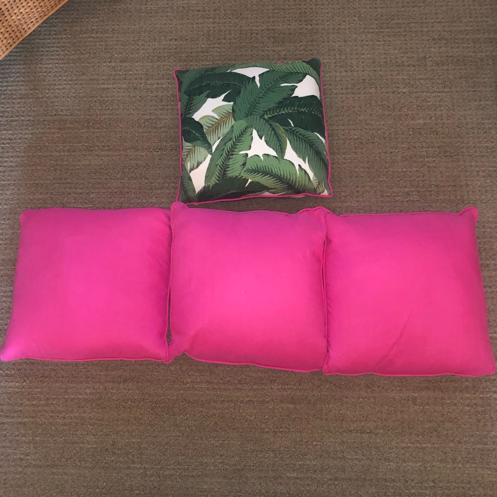 3 hot pink pillows